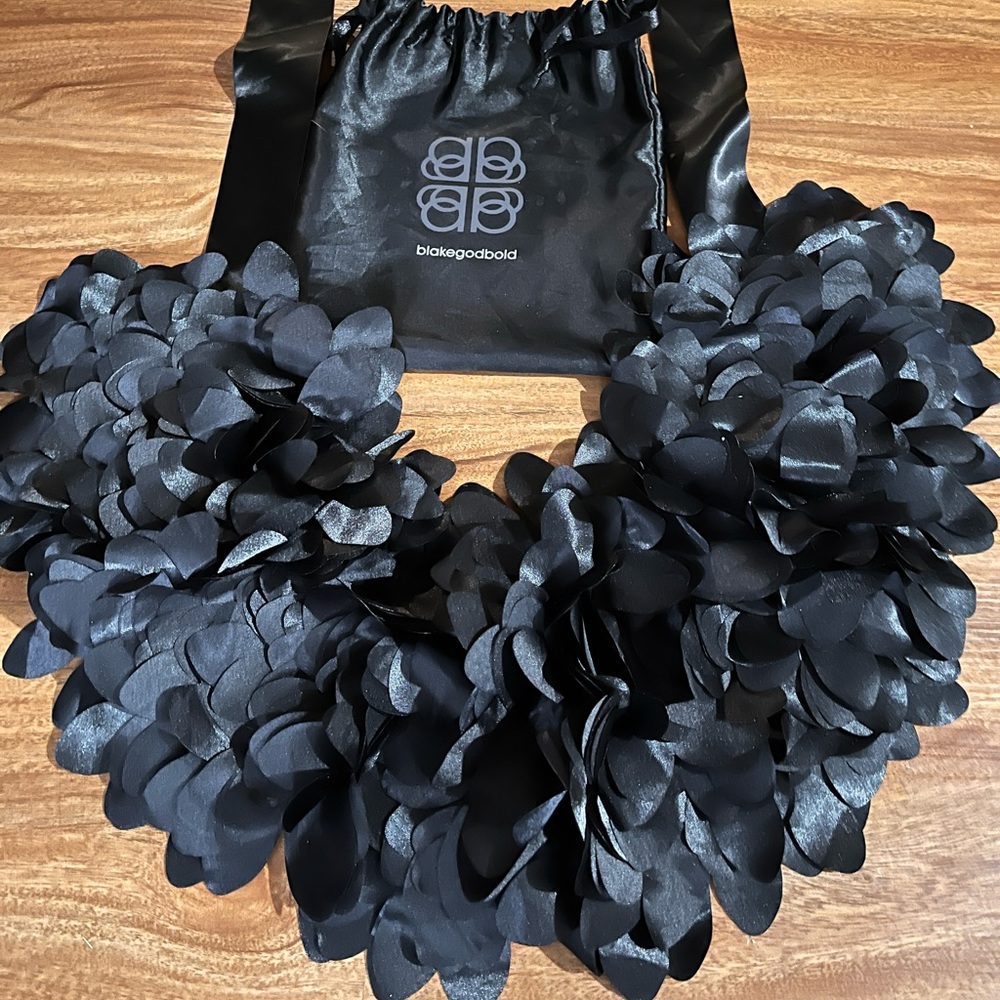 Black ruffle bib